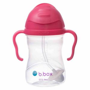 Botella B.box color frambuesa con pajita y diseño ergonómico.