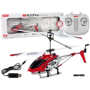 Helicóptero SYMA S107H rojo en vuelo mostrando su diseño aerodinámico.