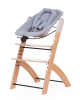 Asiento Newborn Evosit con funda de jersey negro montado sobre trona