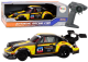 Coche Teledirigido Amarillo 1:16 con Ruedas de Goma