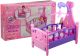 Cuna grande para muñecas rosa y púrpura con móvil de Lean toys, ideal para juegos de rol.