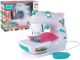 Máquina de coser infantil blanca con detalles realistas.