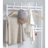 Mueble zapatero metálico blanco con percheros