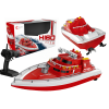 Barco teledirigido HI60 en color rojo sobre el agua, perfecto para carreras