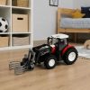 Tractor agrícola teledirigido Lean toys para recrear tareas de granja