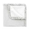 Manta reversible 65x65x1 cm Polo Grey de Cambrass con volante fruncido.