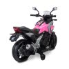 Moto Honda NC750X rosa Toyz, detalle ruedas de entrenamiento y faros LED