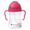 Botella B.box color frambuesa con pajita y diseño ergonómico.