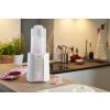 Calentador Chicco 129560 en uso en una cocina moderna.