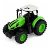 Tractor de granja en acción en el jardín