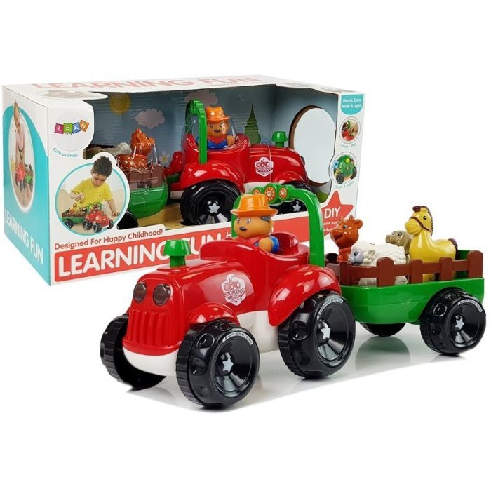 Tractor con remolque y animales