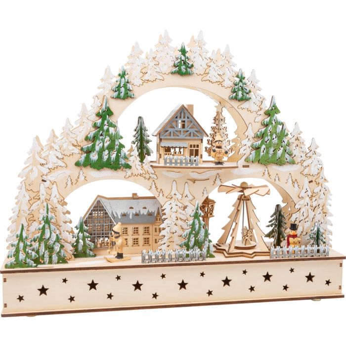 Pueblo de invierno con arco luminoso