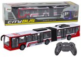 Autobús de ciudad teledirigido rojo y blanco de Lean toys junto a sus luces encendidas.