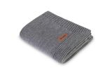 Manta Merino Melange 90x75 de Sensillo, gris oscuro, regula la temperatura.