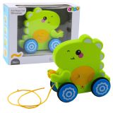 Juguete de arrastre dinosaurio con sonidos y sonajero verde