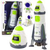 Cohete espacial con astronautas y efectos luminosos de Lean toys