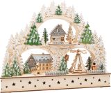 Pueblo de invierno con arco luminoso