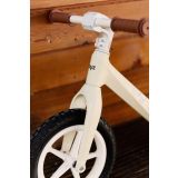 Bicicleta de equilibrio Inter con diseño pastel, altura ajustable, ruedas grandes y sillín de eco-cuero. Ideal para niños de 3 a 6 años.