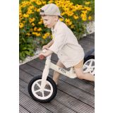 Bicicleta de equilibrio Inter con diseño pastel, altura ajustable, ruedas grandes y sillín de eco-cuero. Ideal para niños de 3 a 6 años.