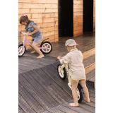 Bicicleta de equilibrio Inter con diseño pastel, altura ajustable, ruedas grandes y sillín de eco-cuero. Ideal para niños de 3 a 6 años.