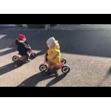Dini & Debi Riding Kinderfeets Trycicles