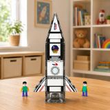 Niños jugando con bloques magnéticos en un escenario espacial