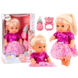 Muñeca con Vestido Rosa que Hace Sonido y Orina