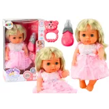 Muñeca con vestido rosa claro y sonidos de biberón