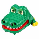 Niños jugando con el Cocodrilo Loco en una sala de juegos