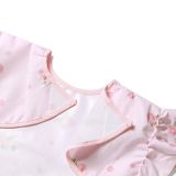 Delantal de Babyono, fabricado en poliéster recubierto.