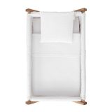 Minicuna Tijera Madera Unic en color crudo, fabricada en 100% algodón para el confort del bebé.