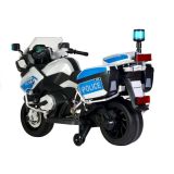 Motocicleta eléctrica para niños en el jardín, perfecta para jugar