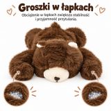 Osito de peluche en posición acostada, ideal para abrazos