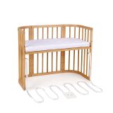 Cuna Waldin en habitación infantil, ideal para bebés