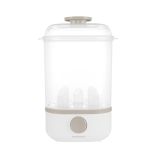 Esterilizador Clyde Beige Kikkaboo en uso para calentar alimentos