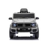 Coche eléctrico Mercedes G 4x4 gris 24V con ruedas EVA y puertas abatibles, vista lateral