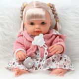 Muñeca niña con suéter y sonidos 30 cm