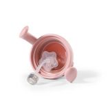 Vaso antirrebosante Babyono, material plástico seguro y colorido.