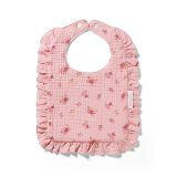 Babero de muselina rosa Babyono con volantes y diseños florales.