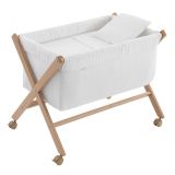 Minicuna Tijera Madera Unic en color crudo, fabricada en 100% algodón para el confort del bebé de frente