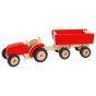 Tractor rojo con remolque , Goki